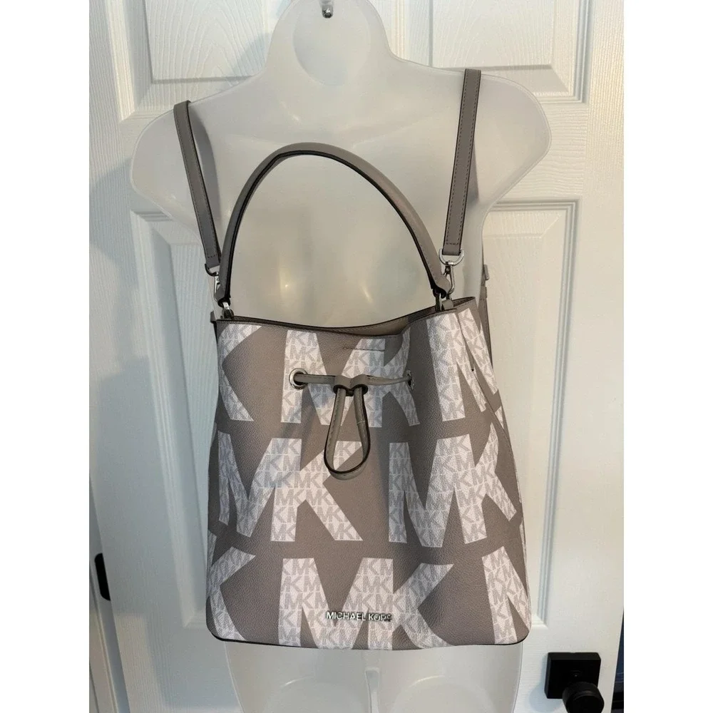 Michael Kors Suri Gray White Monogram Logo Print Convertible Bucket Backpack Bag